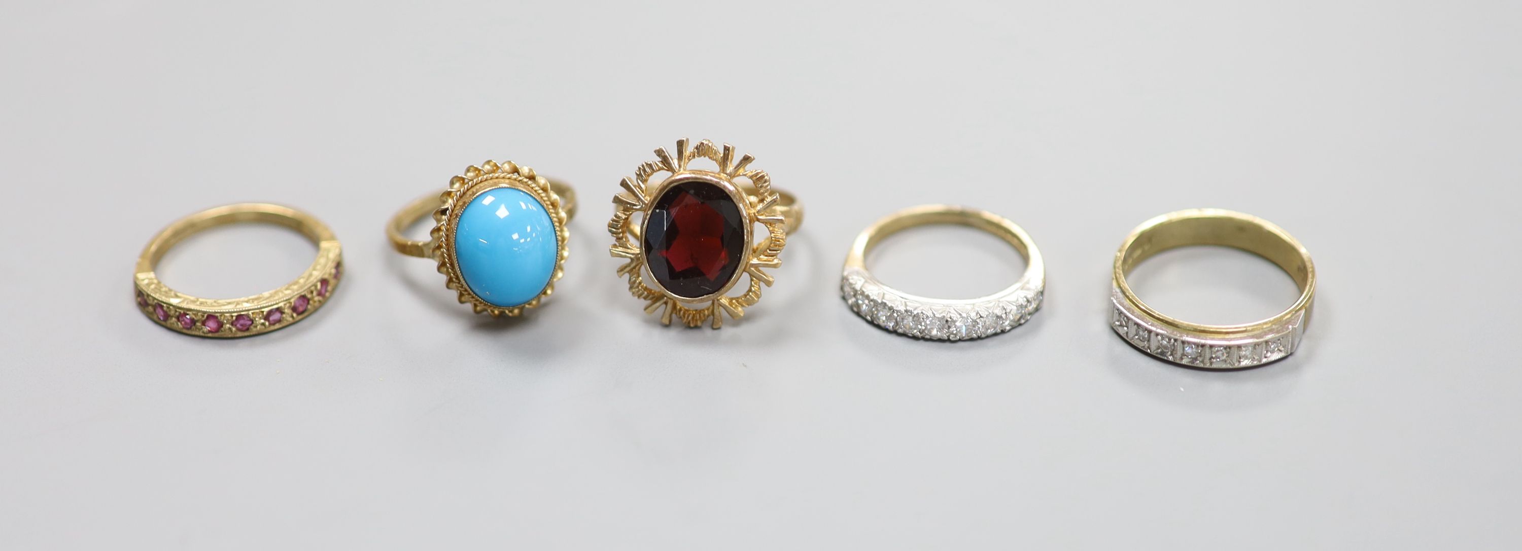 Five assorted modern 9ct gold and gem set rings including seven stone diamond chip ring, turquoise and ruby